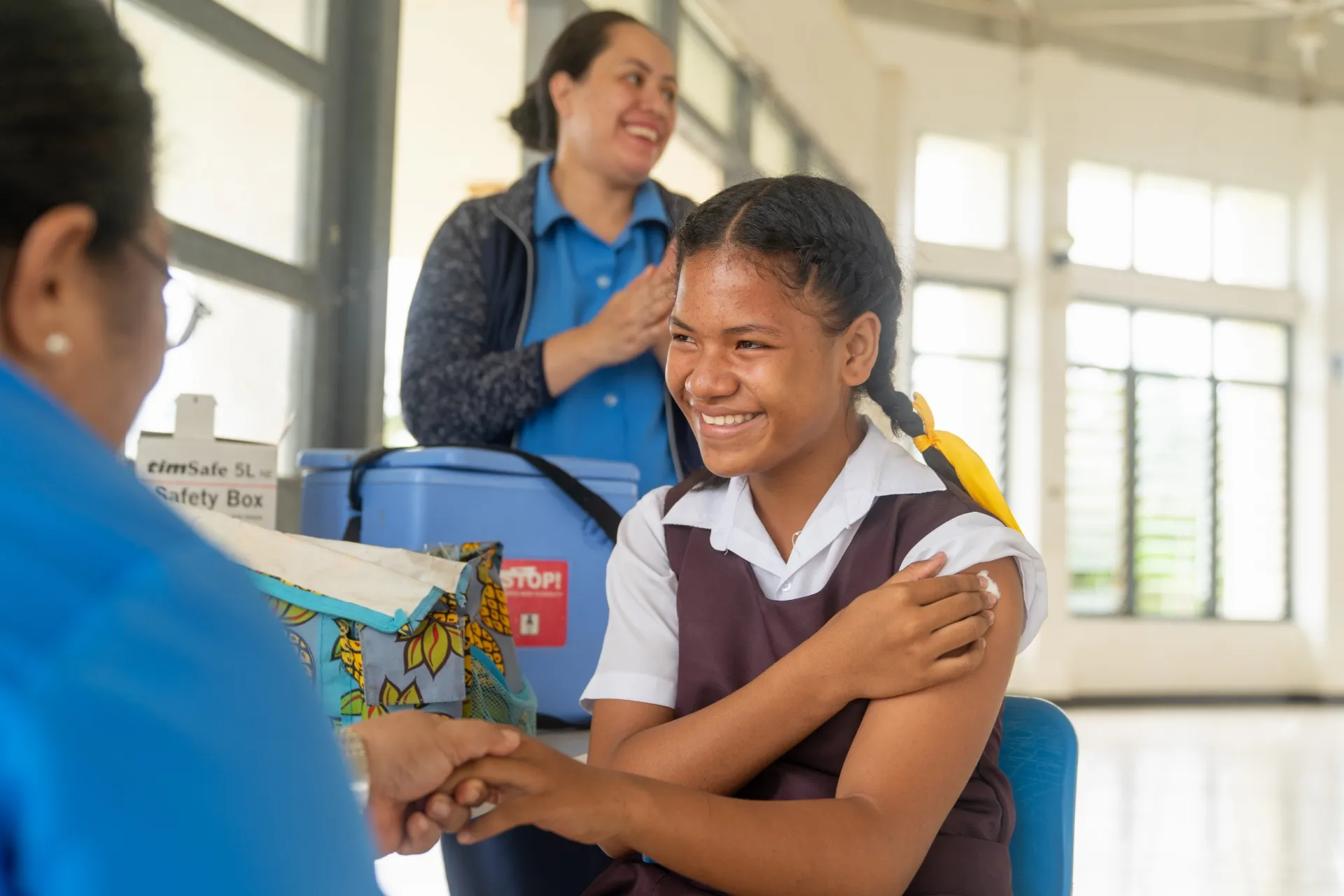 14-year-old girl Asinate Finau after receiving her HPV vaccine at Ha&rsquo;apai high school.