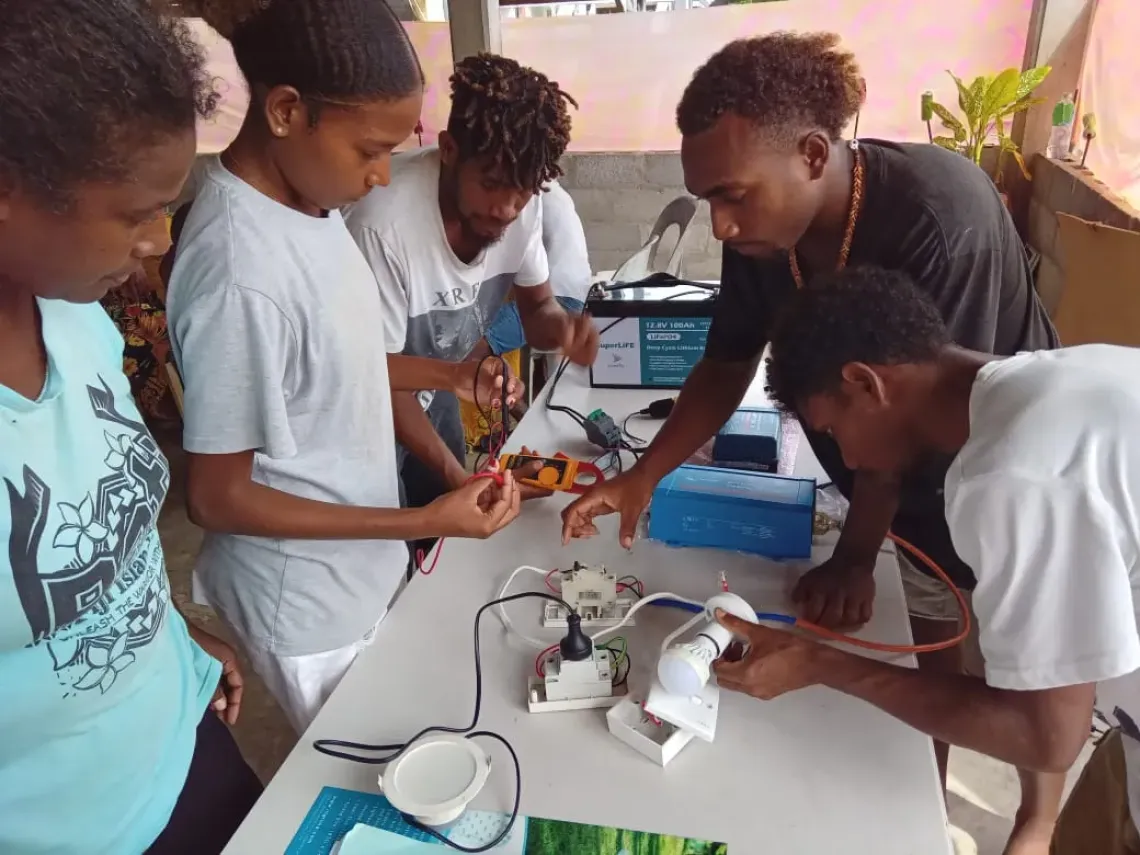 Students learn about electrical circuits in Solomon Islands