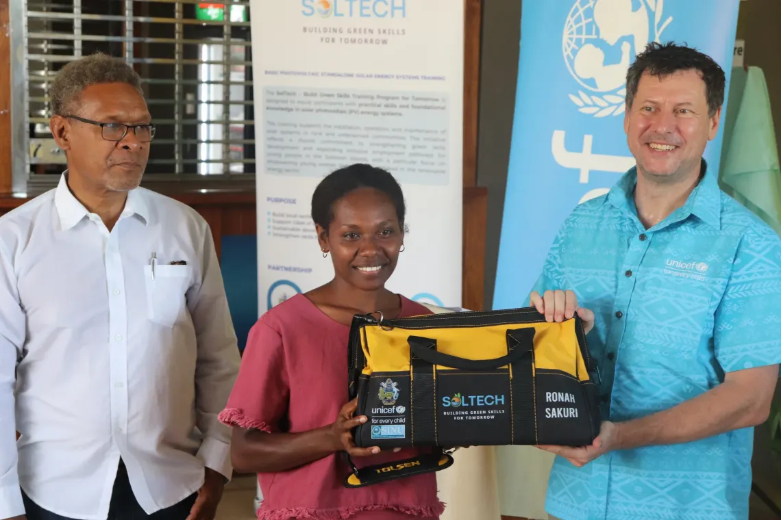 Ronasah Kuri from Solomon Islands receives her new solar tool kit following training