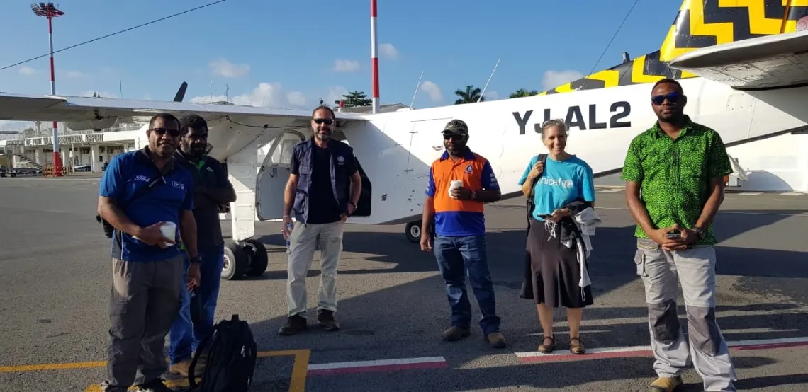 UNICEF personnel on their way to visit cyclone affected islands.