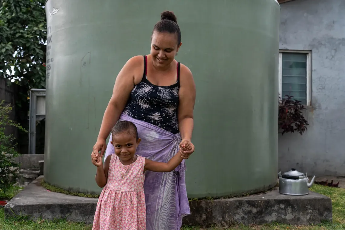 Stephany, a mother injured during the 7.3 earthquake, and her 3-year-old daughter were grateful to be among the first to receive water trucking support from UNICEF Vanuatu and the Department of Water in Mele Village after local water supplies were devastated.