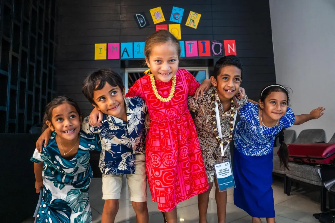 Children from Pacific island posing after taking part in a &lsquo;Talanoa&rsquo; panel discussion at the 2025 ECD forum, Apia, Samoa. 