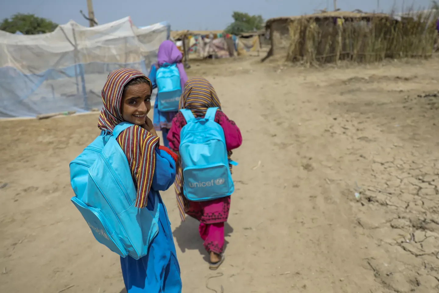 girls walk to school in Jaffarabad