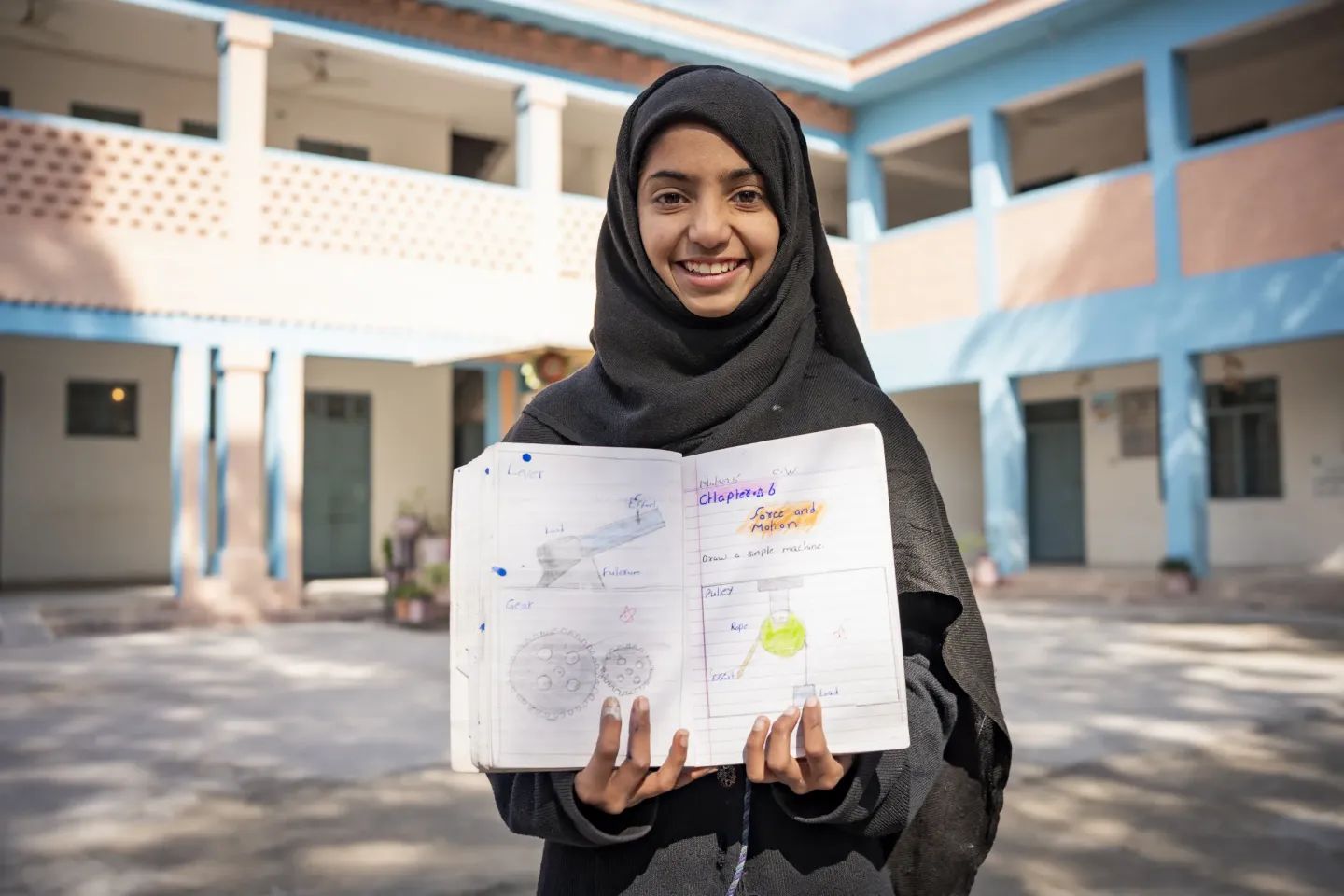 12 year old Madeeha shows her drawing