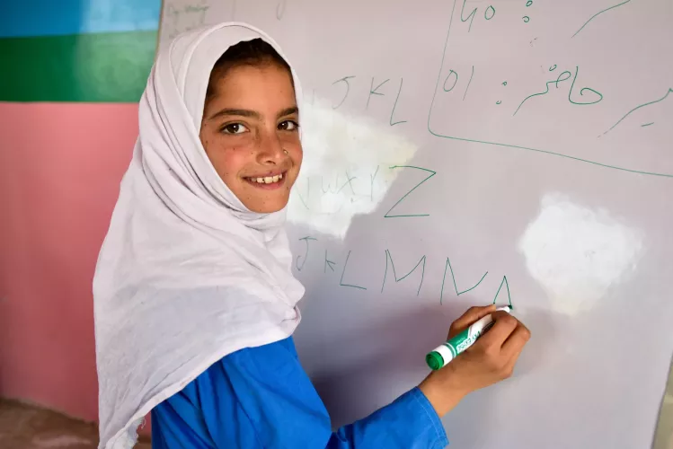 Aqsa Mustafa (10) is a grade 1 student at the newly built Temporary School Structure in village Mohammad Ramzan Jamot, a remote and underserved area in Lasbela district, Balochistan.