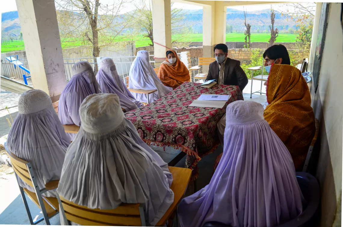 Members of the Volunteer Network Forum (VNF) which include parents, influencers and community activists, discuss matters pertaining to ALP with the Assistant District Education Officer and the District Coordinator from the Education Department KP.