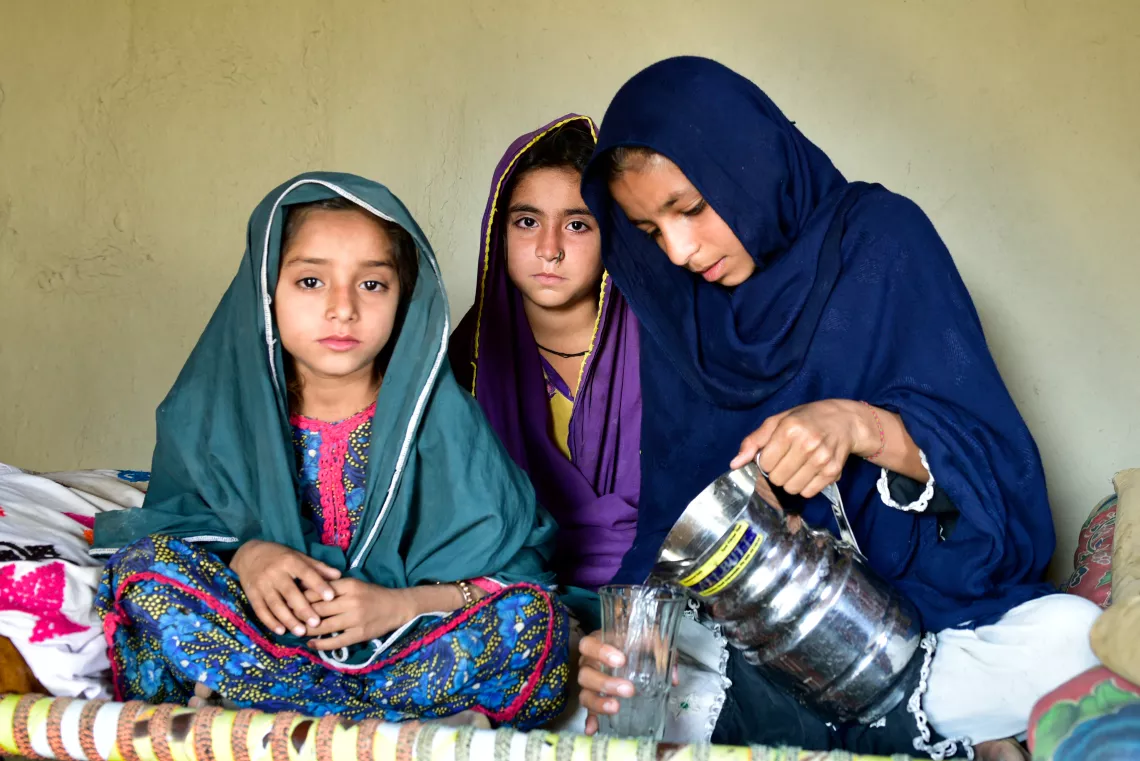 Mehreen drinks a glass of water