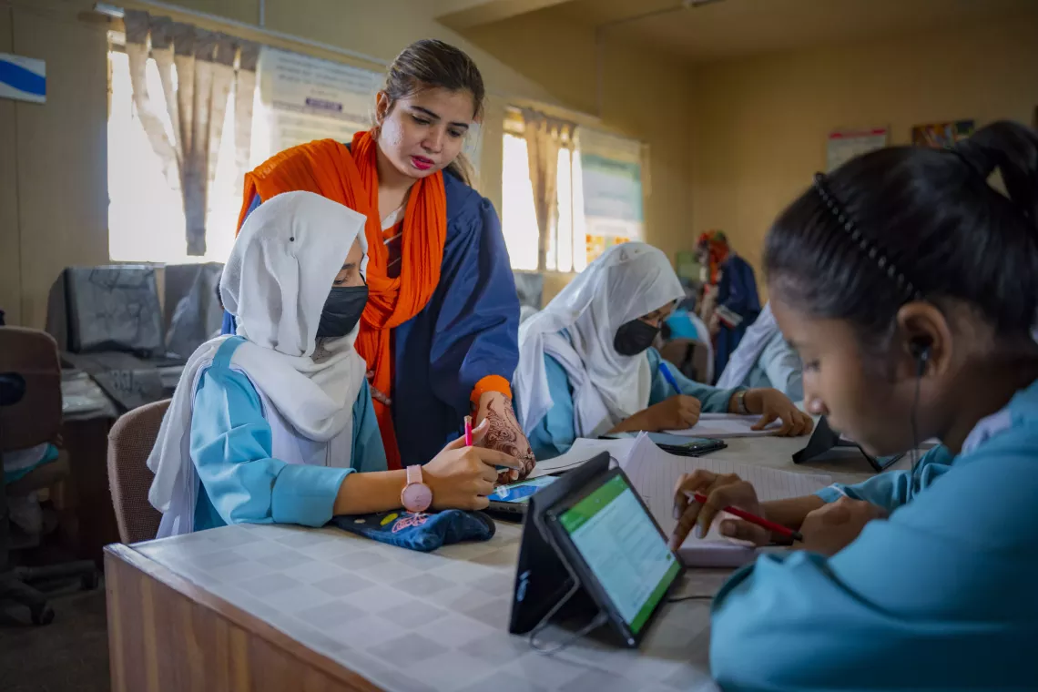 Class 8 Mathematics teacher, Muniba Khan, assists students when they need further explanation of concepts.