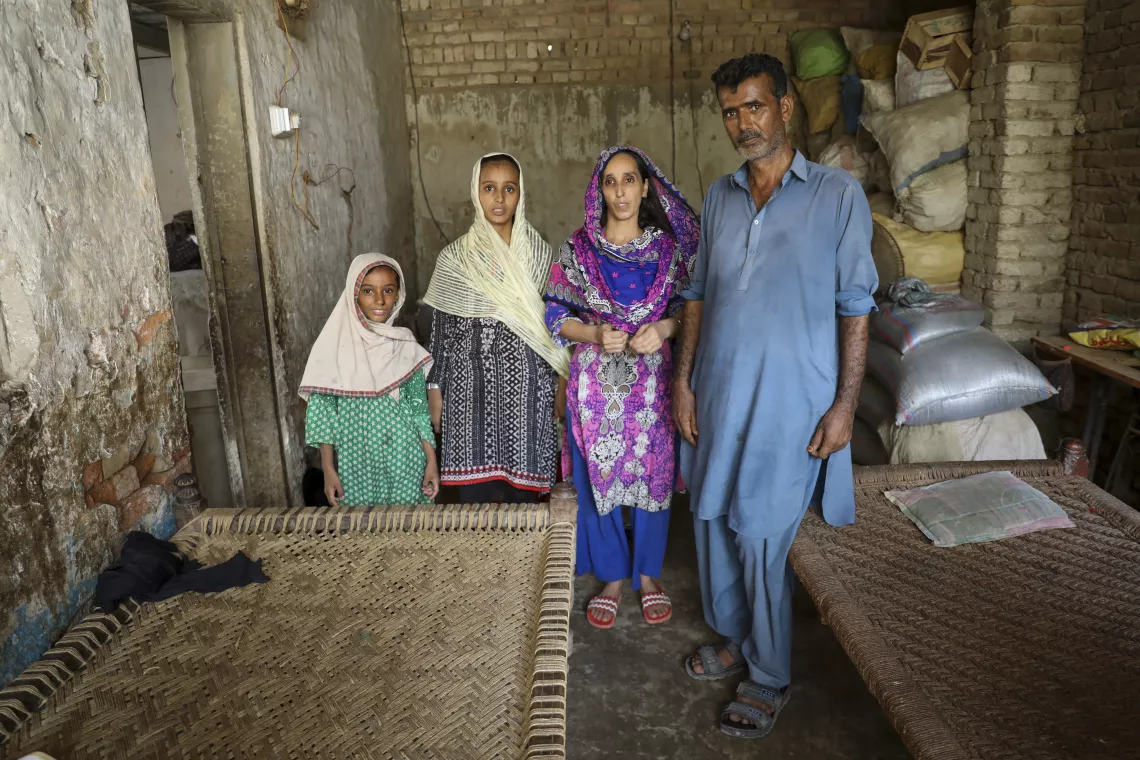 Emaan and her sister Hoorain at their home with their parents in Janalo Khan village, Naushero Feroz District, Sindh.