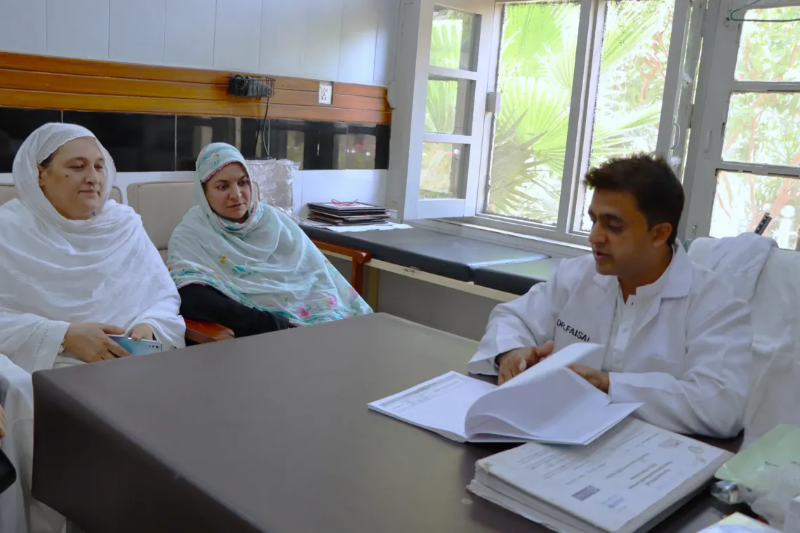 Dr. Faisal, In-Charge BHU speaks with Lady Health Workers.