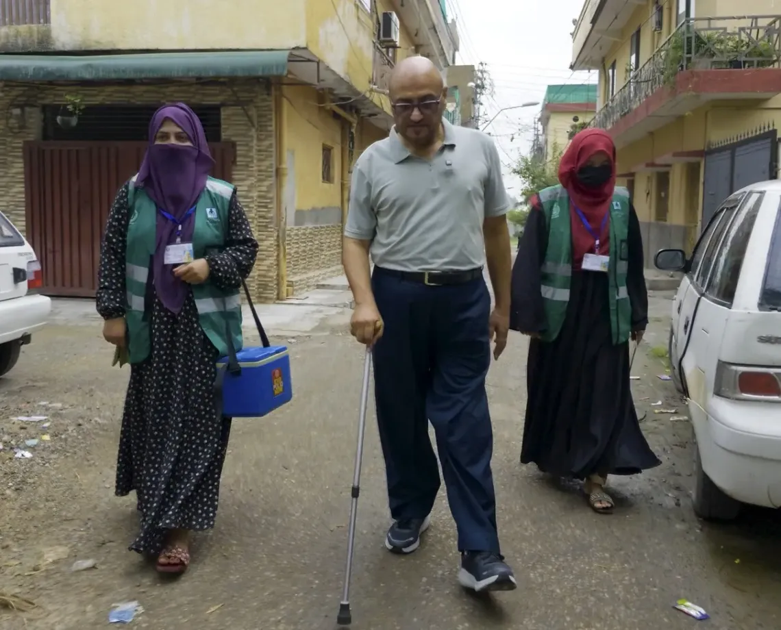 Ijaz with Polio workers
