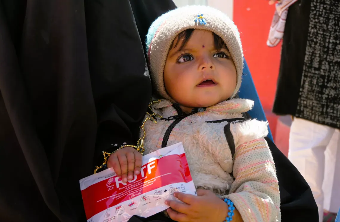 Seventeen-month-old Naila, a beneficiary of the Integrated Services, program, visits BHU Saraghurgai, District Quetta