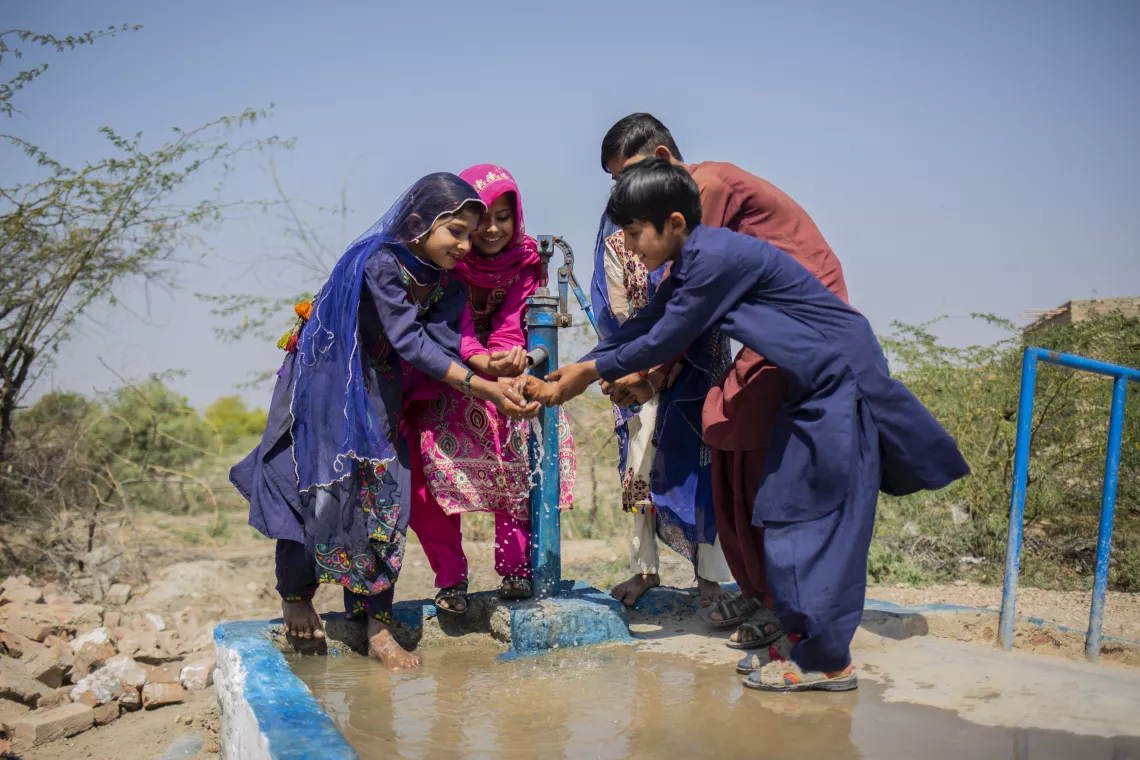 The new hand pump provides clean, safe water to all 40 households in the village. 
