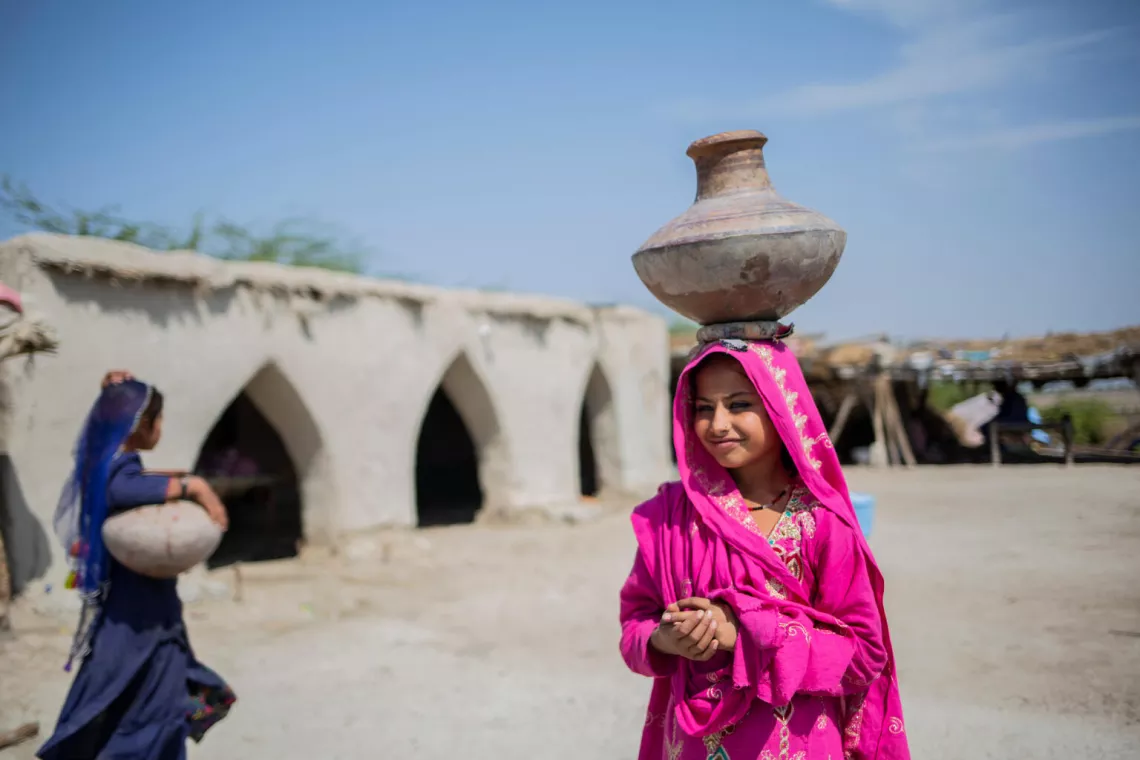 Before a hand pump was installed in her village, Farzana would walk up to 20 kilometres a day to collect clean water for her family and carry it back on her head. 