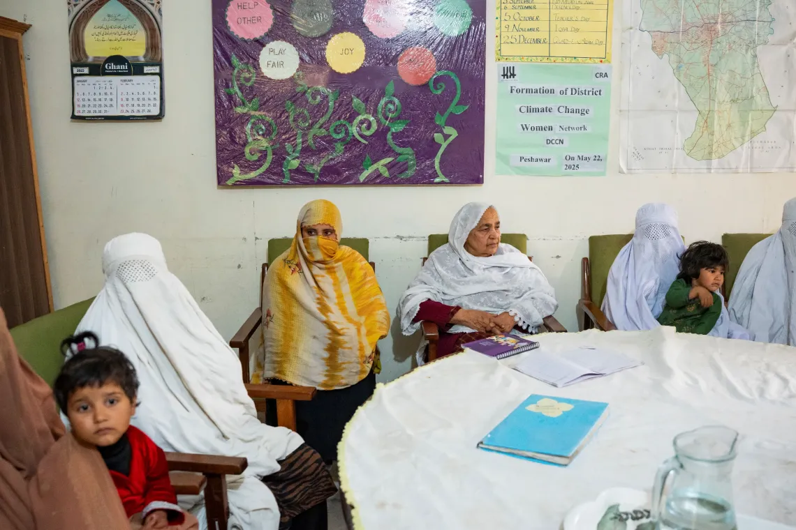 Mariam Bibbi discusses school affairs and students&rsquo; progress with their mothers at the Zoe Bibi Primary School in Mathra, Khyber Pakhtunkhwa