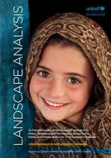 A young girl smiles at the camera