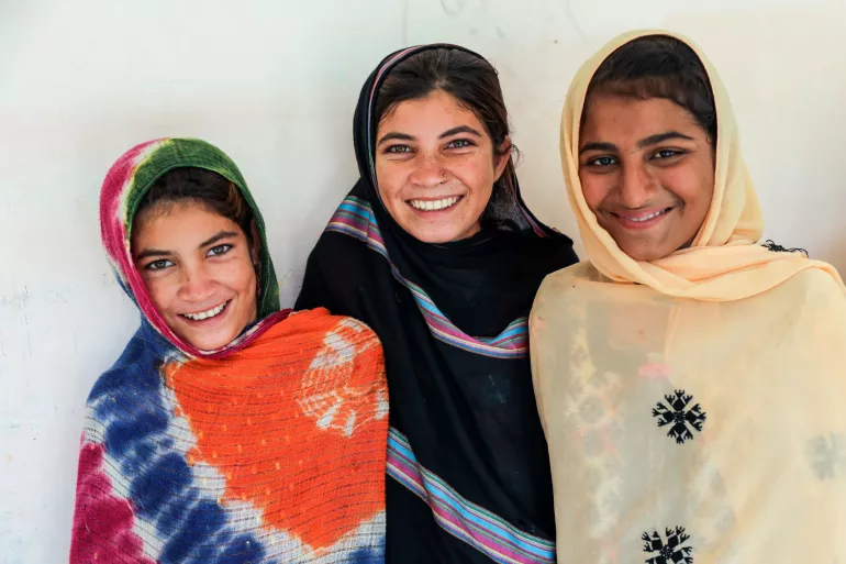 Adolescent girls standing together