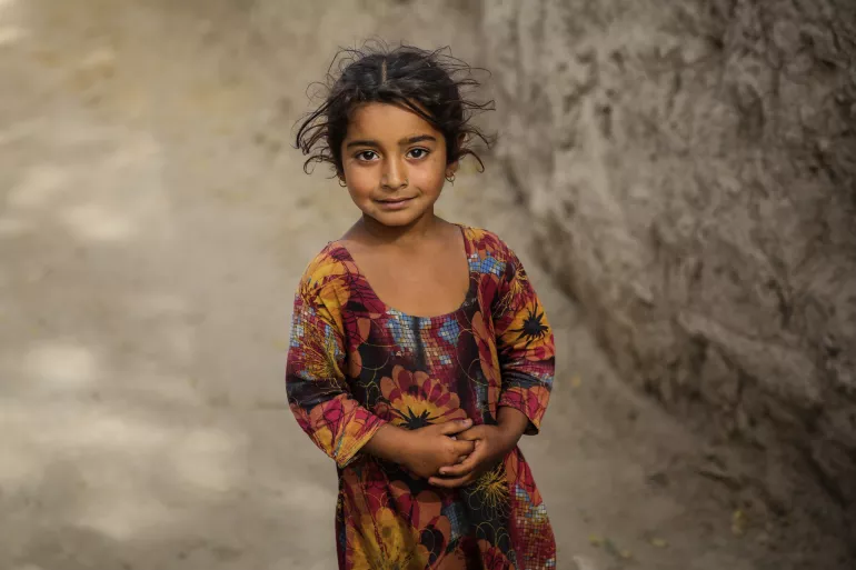 A young girl from Punjab poses for a photograph
