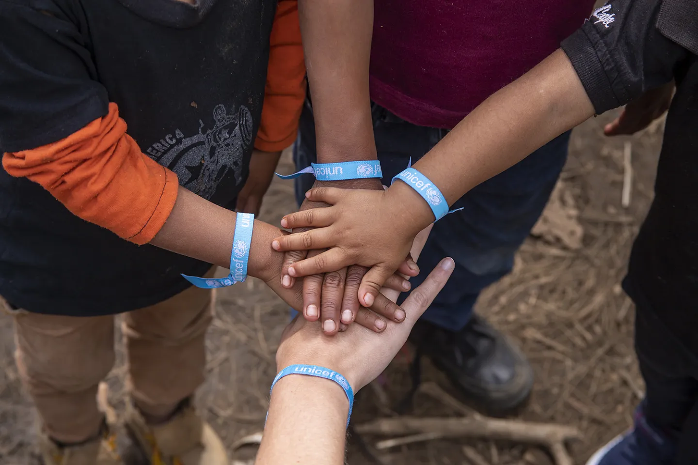 Pilar Escudero, Communication Associate at UNICEF Guatemala plays with Herson (4), Oscar (8) and Edwin (3) on February 27, 2022 in San Cristobal, Alta Verapaz, Guatemala.