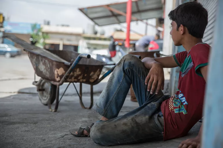 Ni&ntilde;o trabajando