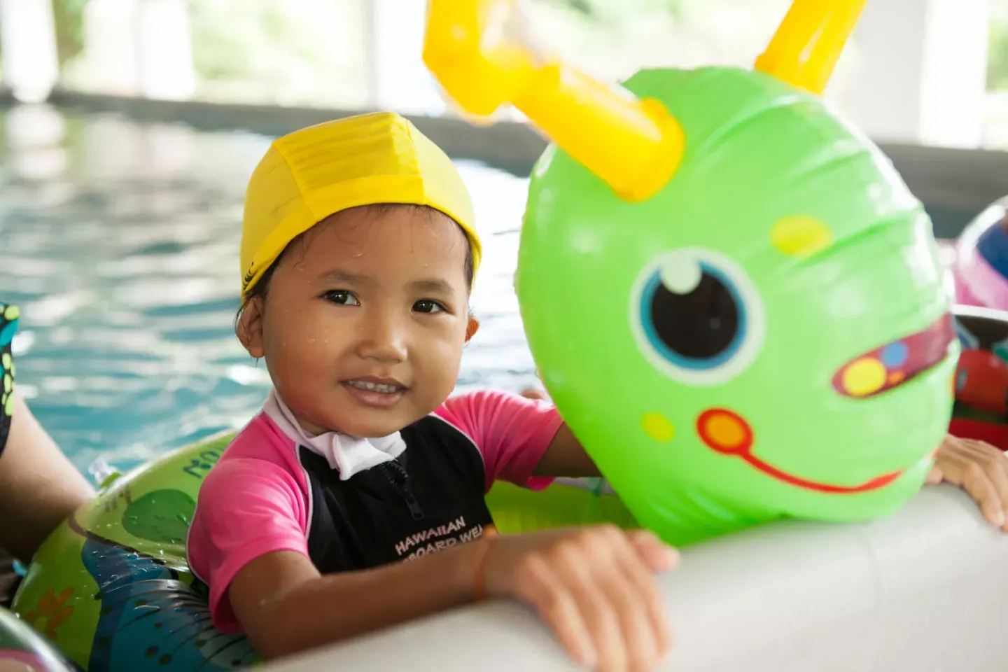 Students at Huayprayai Padungvitaya School in Sakon Nakhon Province, Thailand learn swimming in the portable pool that UNICEF provides under the UNICEF-supported SwimSafe project, which is aimed at preventing drowning in children.