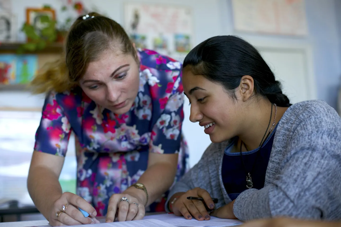 Talking to school about bullying: A teacher speaks with a student