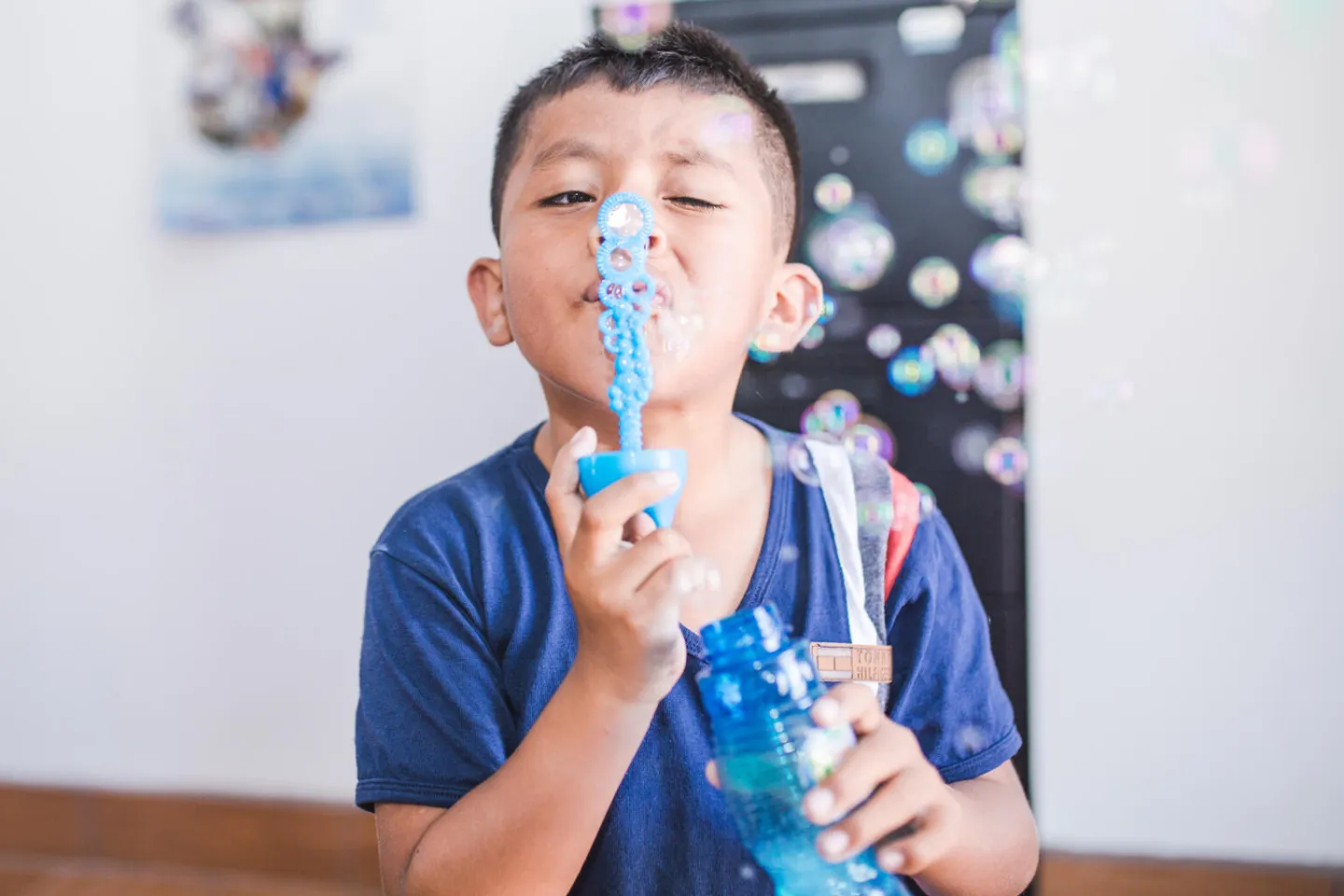 Giovanni Ju&aacute;rez Cervantes (8 years old) is blowing bubbles at the stimulation center for children with disabilities, supported by UNICEF.