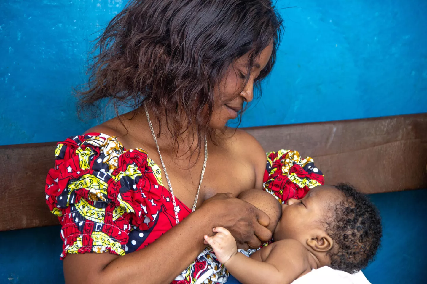 A mother waits for her child to be vaccinated at the UNICEF-supported Mangobo General Referral Hospital in Kisangani, Tshopo Province, DR Congo.