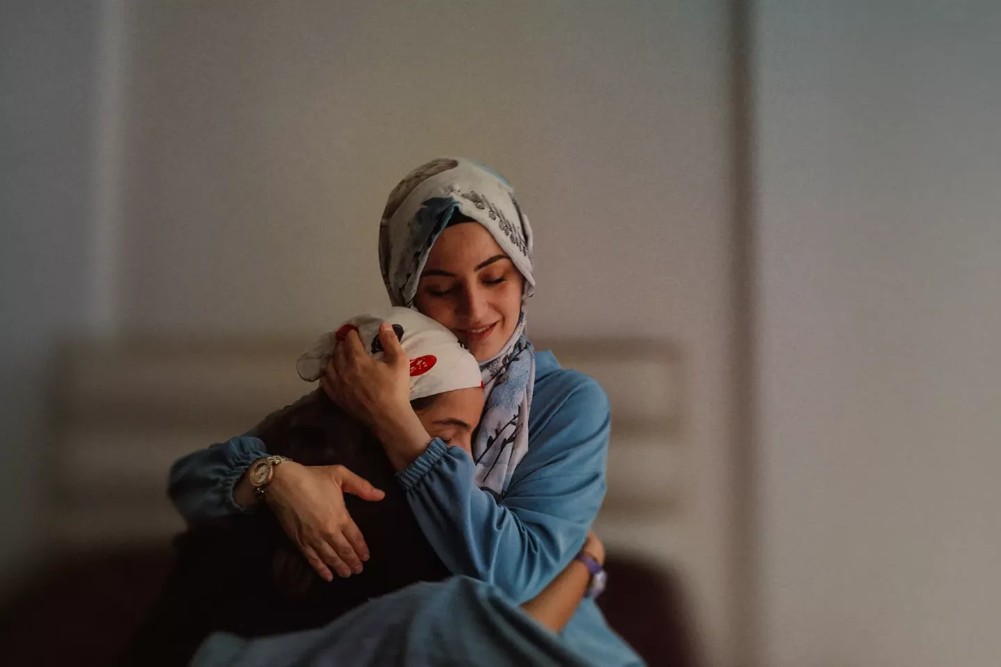 Raising Parents: A mother holds her daughter