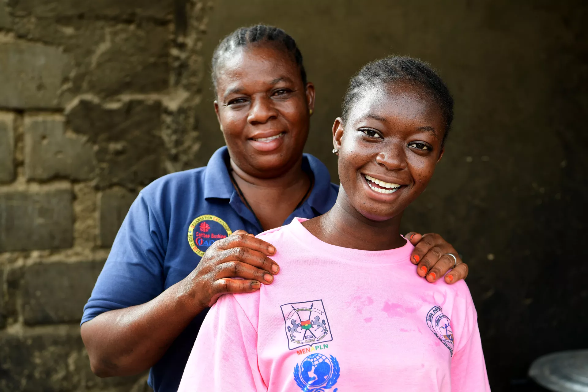 A teenage girl and her mother