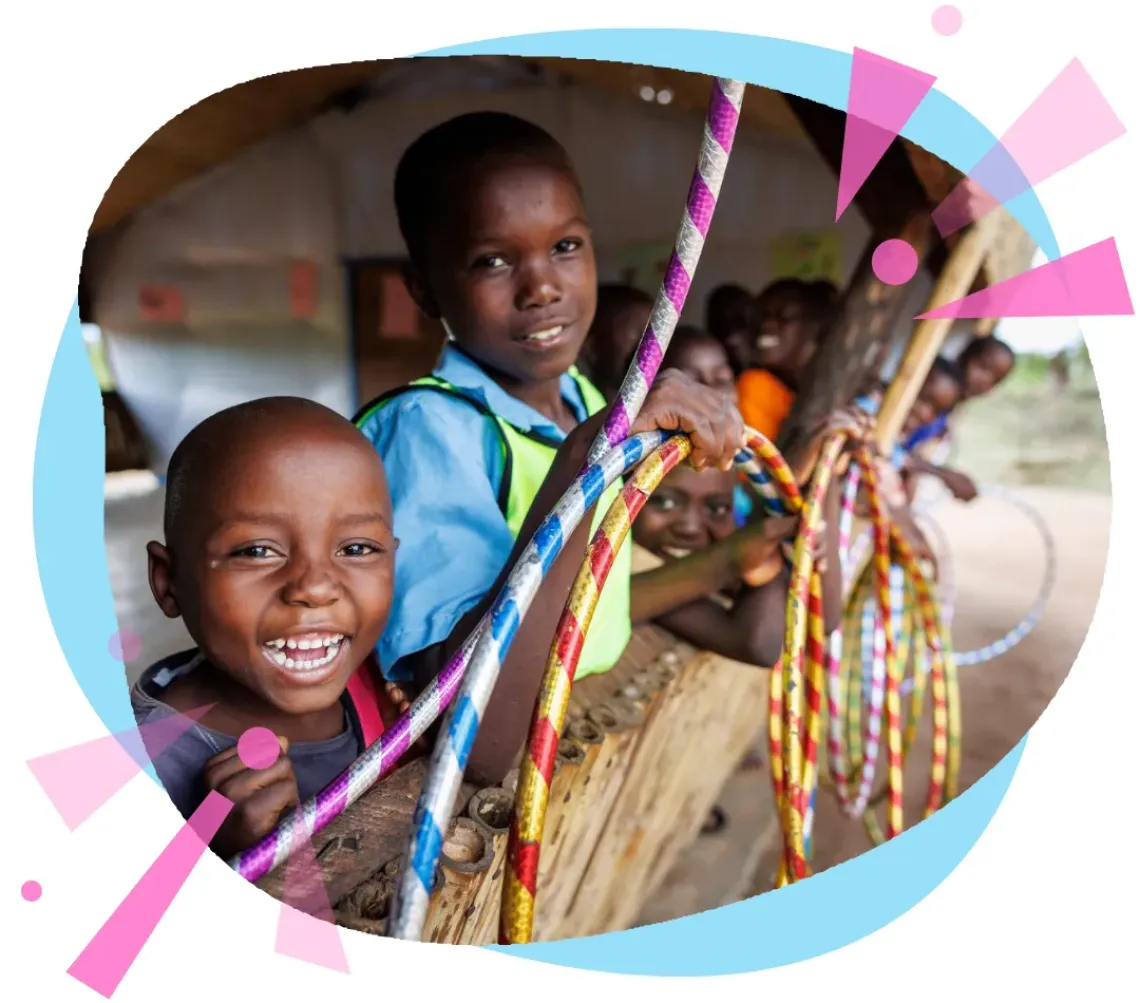International Day of Play: Boys play with hulahoops in Mozambique