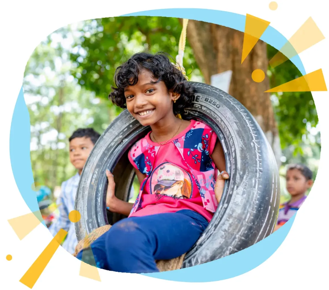 International Day of Play: A child plays on a swing 