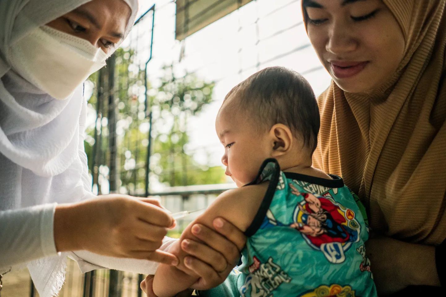 Abdulhakum brings her 9-month-old baby Zainuddin to the Marantao Rural Health Unit for routine vaccination and check-up.