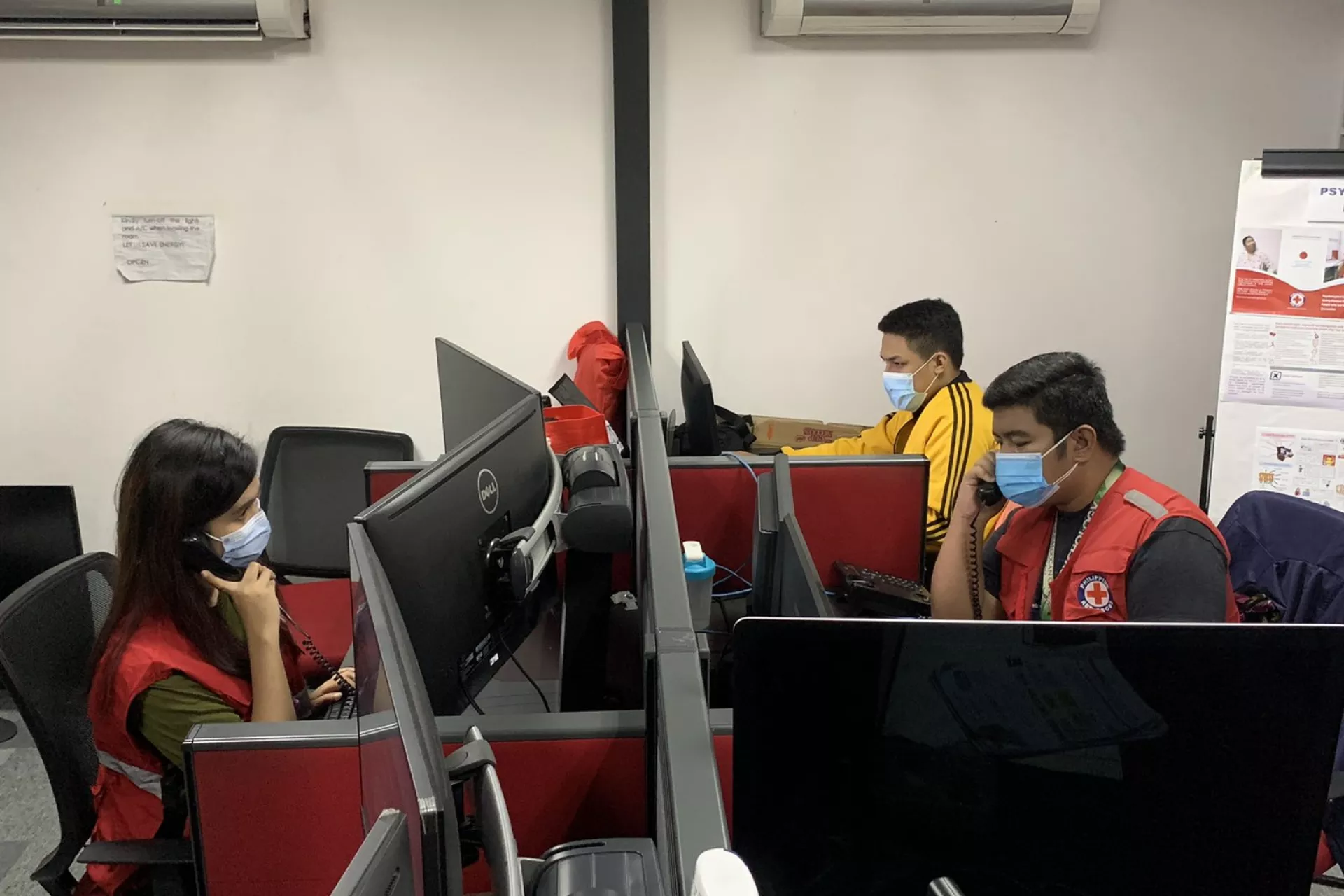 Philippine Red Cross responders, Bea and Justine, at their work station. 