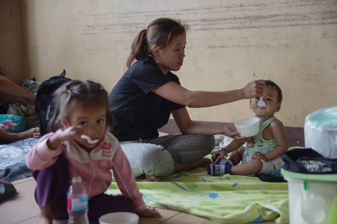 Families seek shelter in an evacuation center in Baseco, Manila as Rolly/Goni made landfall in the Philippines on 1 November 2020.