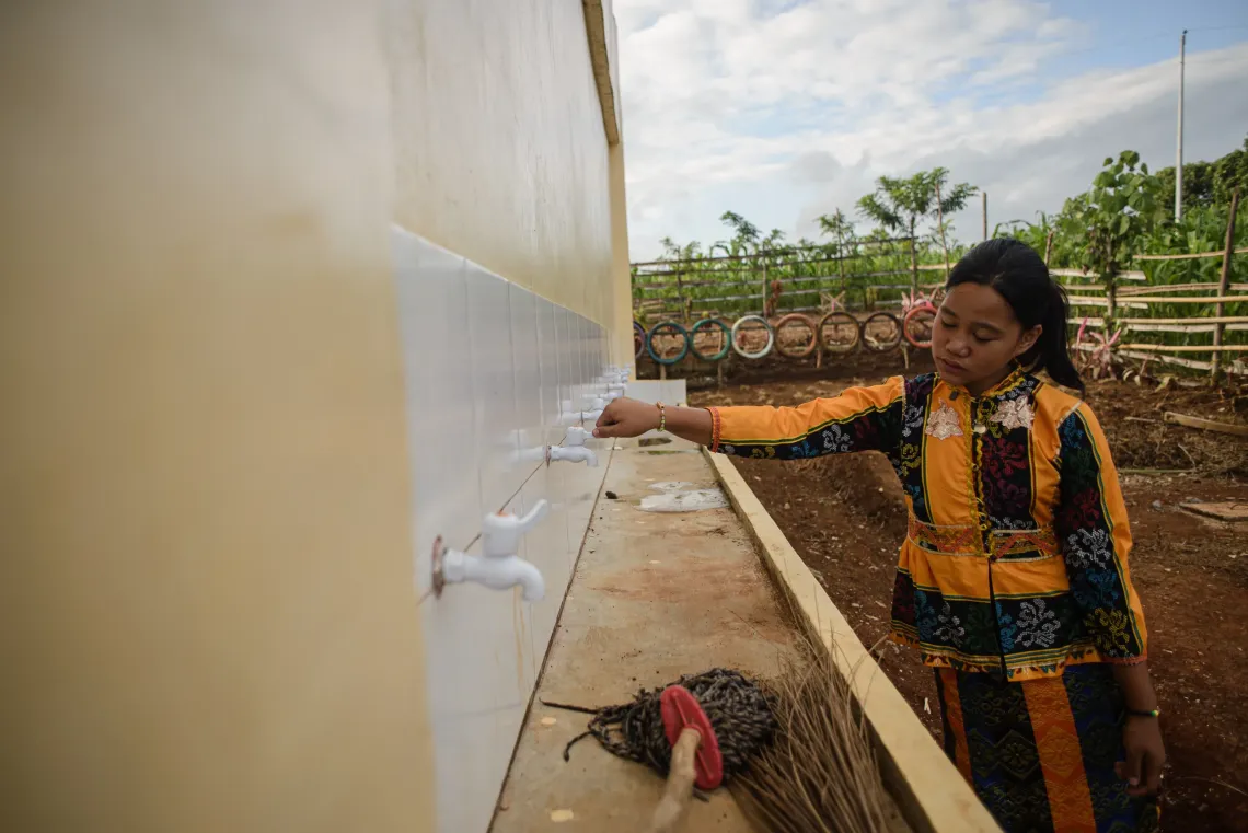 Sharmaine from Maguindanao del Norte opening a faucet
