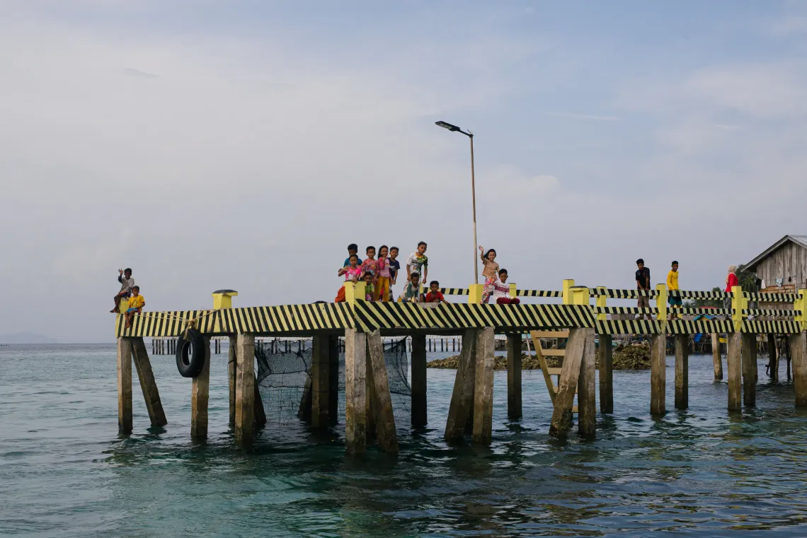 Children wait at a port in Lookan Banaran, Sapa-Sapa, Tawi-Tawi, Philippines