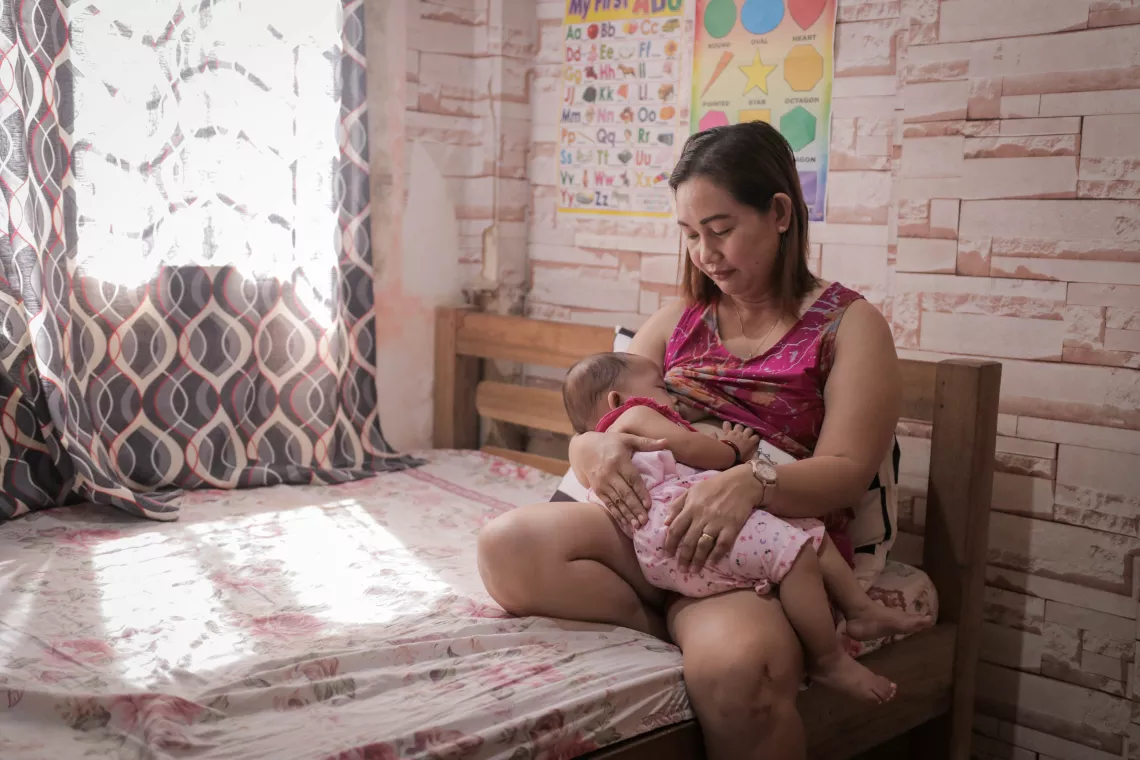 Mom and child breastfeeding