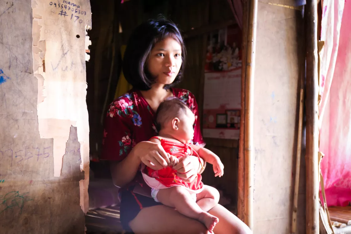 Kimberly holds her baby Princess