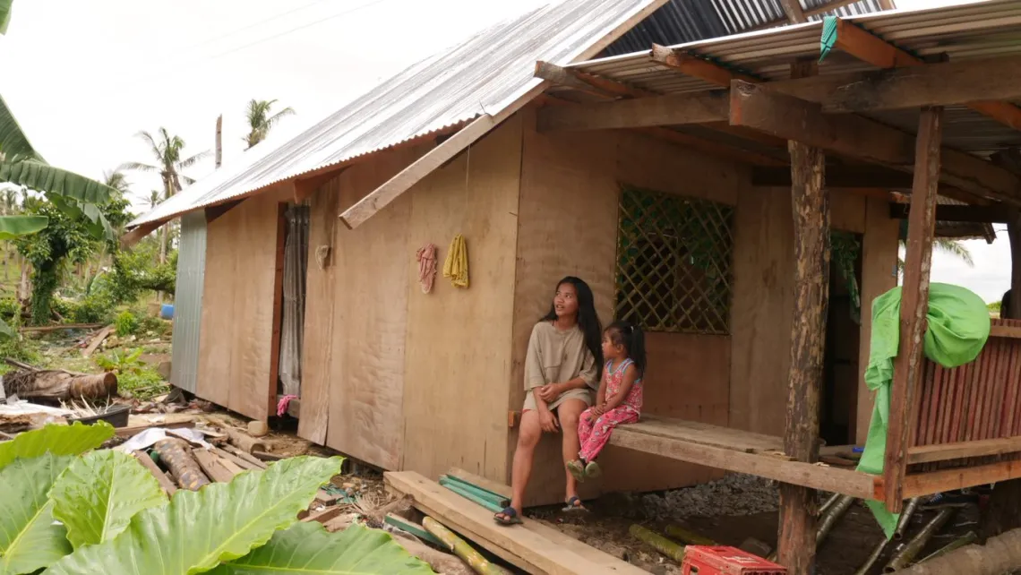 Jasmine and her younger sister at their newly reconstructed home