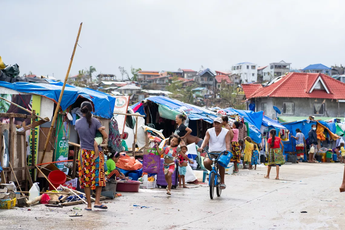 Shanties and makeshift shelters along a road