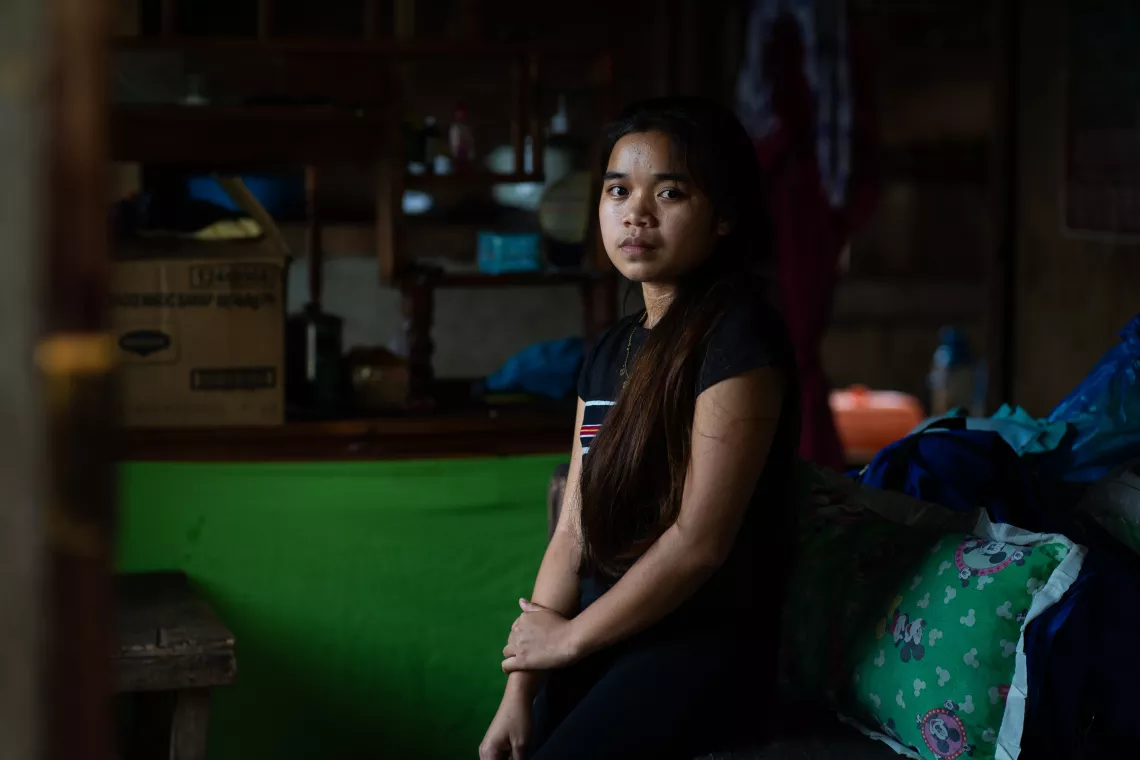 A girl inside her home