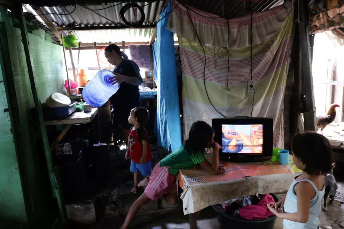 Child watching food advertisements on TV
