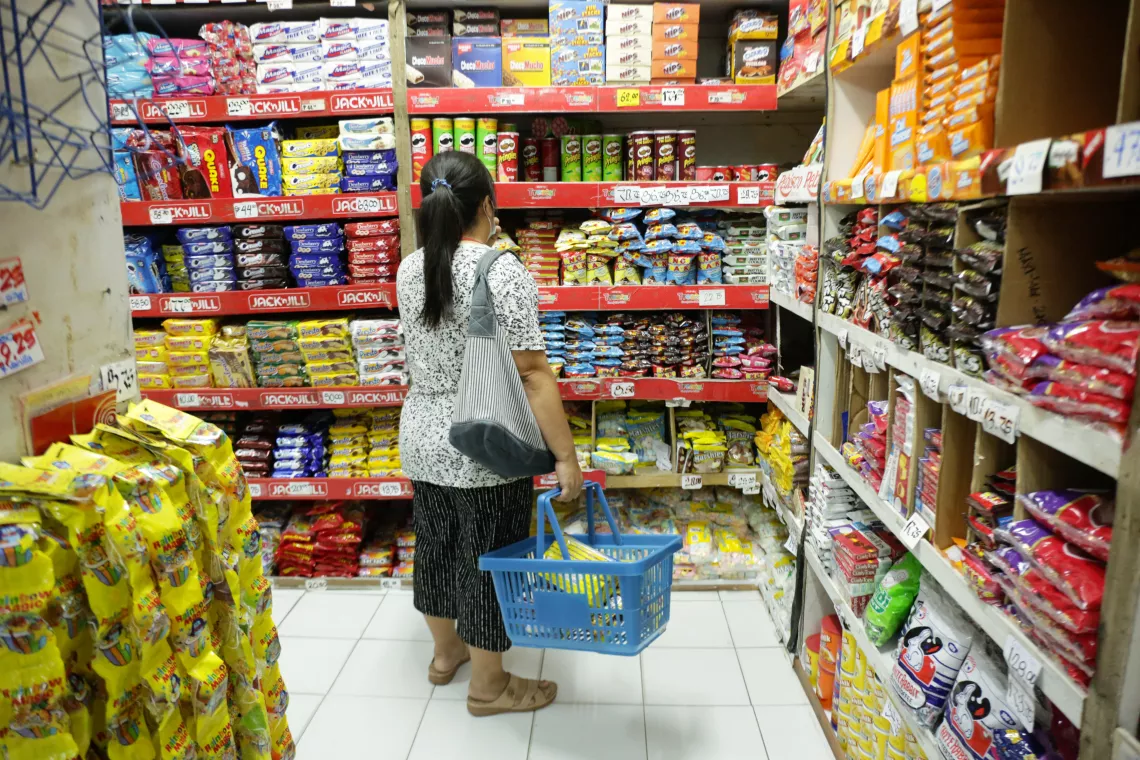 Mother shopping in a supermarket