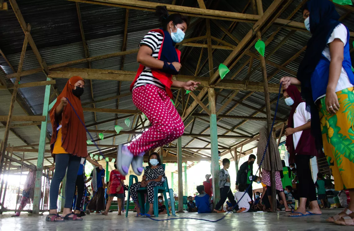 As a psychosocial support intervention, young evacuees play at Libutan Elementary School in Mamasapano, Maguindanao. Youth animators supported by the United Nations Children’s Fund (UNICEF) facilitate the intervention.