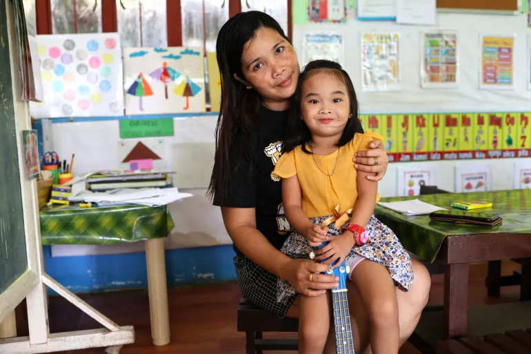 Mother and child in school