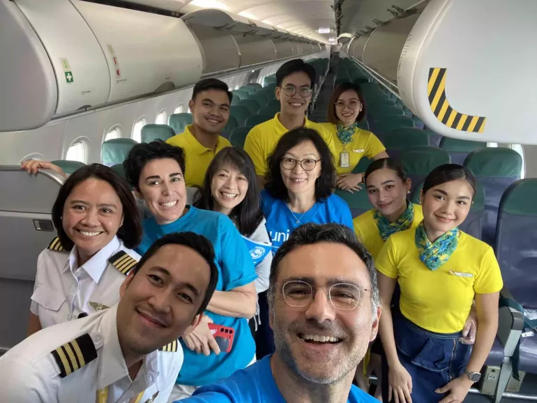UNICEF staff with Cebu Pacific flight attendants