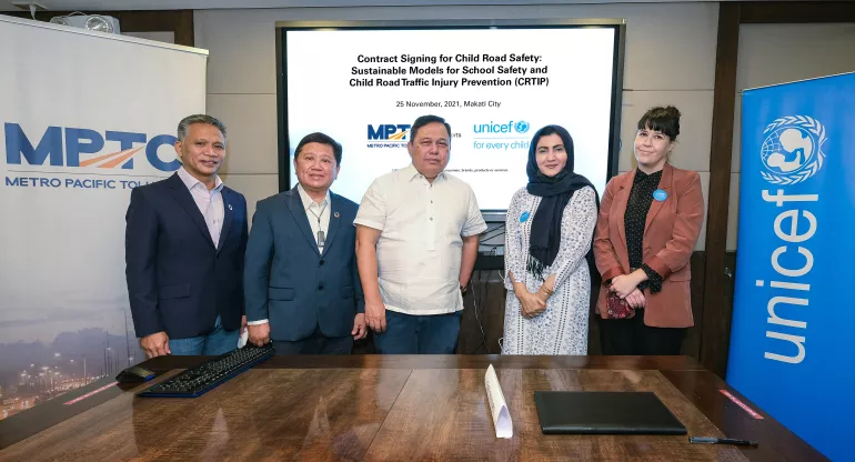Officials from UNICEF and MPTC at the signing of the partnership