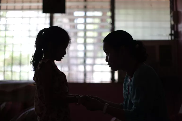 On 13 March 2016, Minda, 9, speaks with a counsellor at the Marillac Hills Centre in the city of Muntinlupa, in Metro Manila, Philippines.