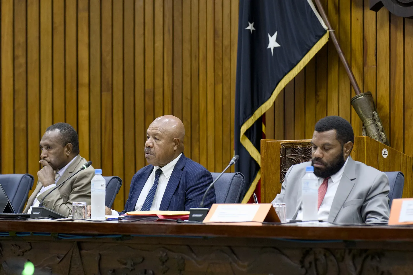 Hon. Powes Parkop, Chairman of the Parliamentary Committee on Children and Youth, with two committee members, at the first parliamentary inquiry holding government agencies to account for the delivery of child-related social sector services.